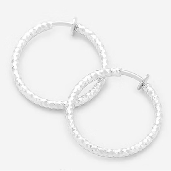 Small Textured Metal Hoop Earrings(Clip On)
(New) - Picture 2 of 3